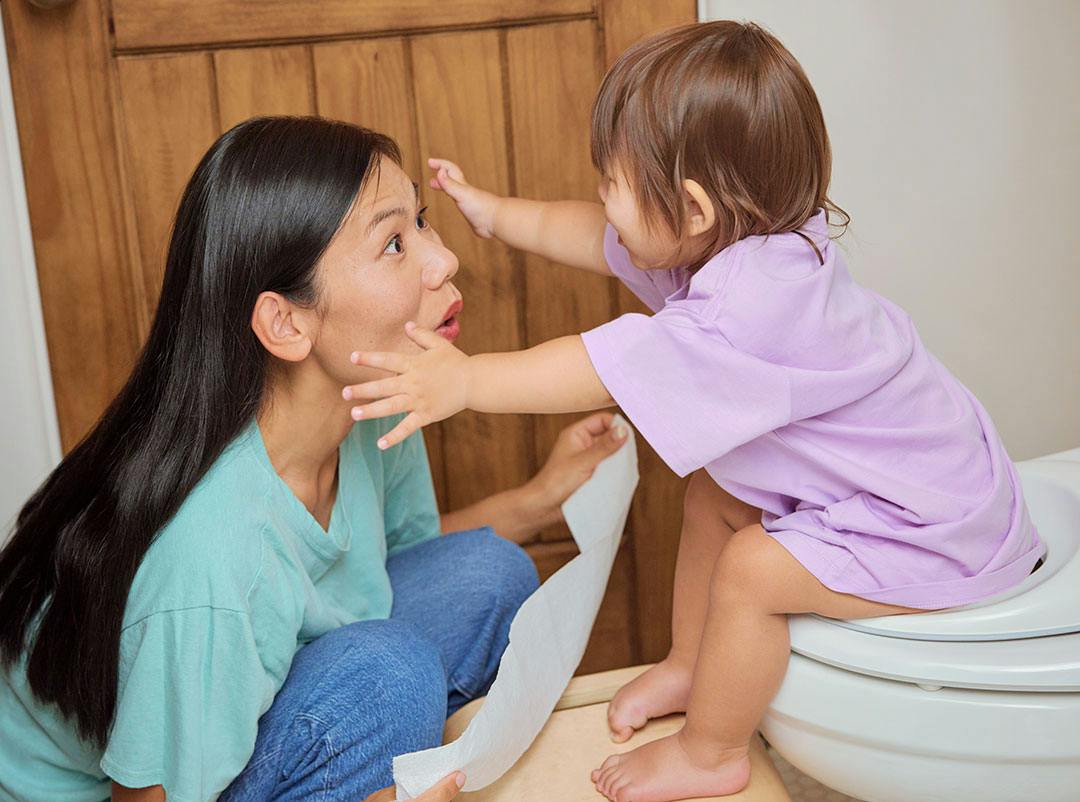 little girl on potty