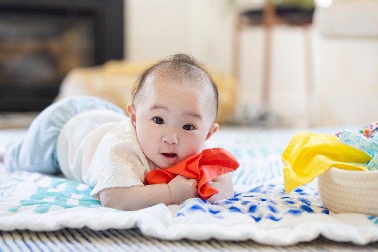 boy on quilt