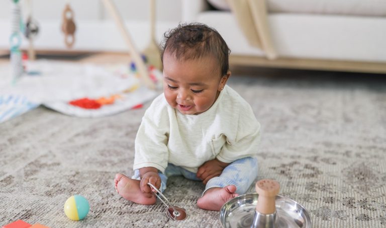 Baby playing with Lovevery toys