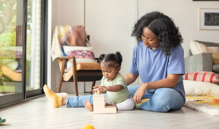 Mother and toddler playing with Lovevery toys