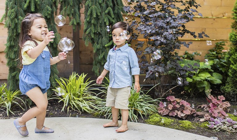 Children play with bubbles.