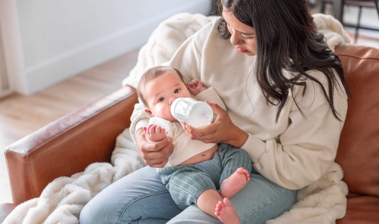 Baby drinking from a bottle