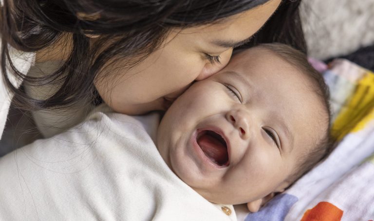 Happy baby with their mom