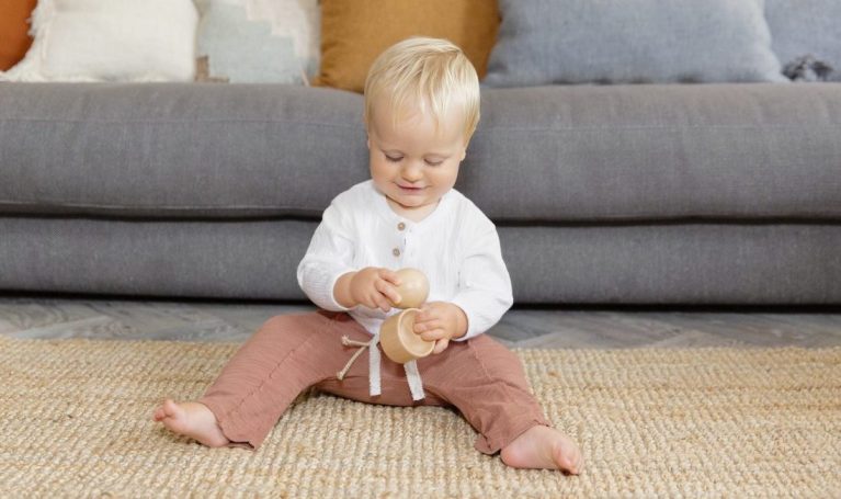 Child playing with the Lovevery Montessori egg