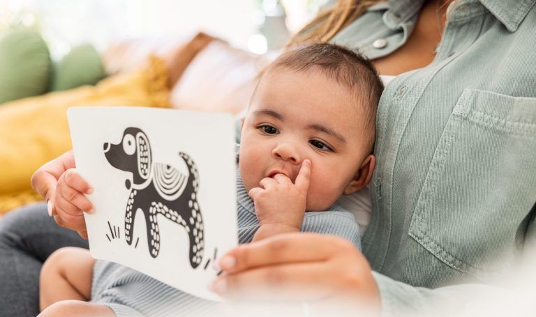 Baby looking at a Black and White Card by Lovevery