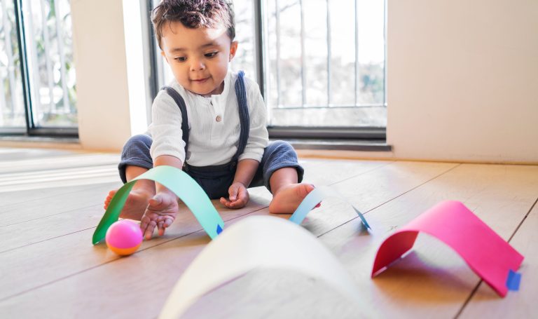 Toddler playing with a DIY activity