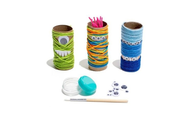 Toilet paper rolls with colorful yarn