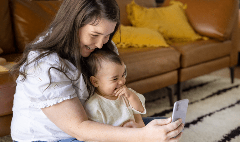 Mom and baby use video chat.